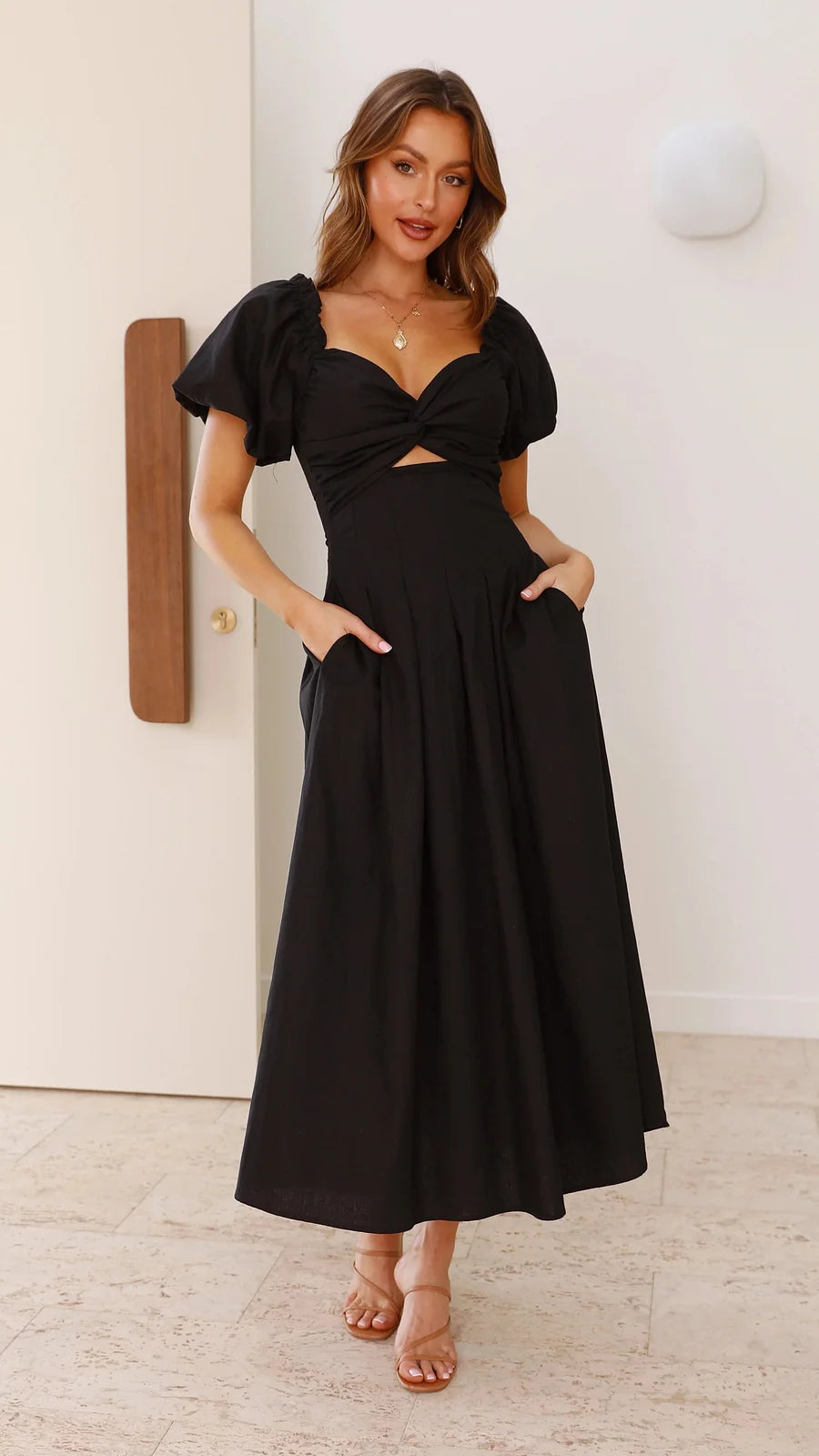 Vestido con cuello en V y mangas abullonadas